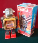 Horikawa (Japan) Battery Operated “Attacking Martian” Robot: Dark grey with tinplate open chest,