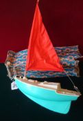 Scalex Boats Plastic Sailing Yacht: Cream Deck with Green Hull having a Red Sail in great