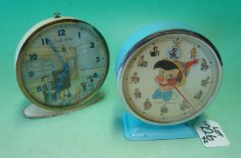 Two Childrens Alarm Clocks: To consist of 1967 Disney Pinocchio and The Schoolmaster Clock both