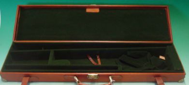 Brown Leather Gunmark Gun Case: Tan Brown having Brass corners and lock and securing straps with