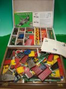 Large Quantity of Meccano: Consisting of Red, Green, Yellow and Blue editions housed in 2 handmade