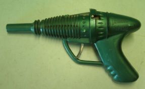 Plastic Thunderbird Cap Gun: Made in Hong Kong in green metallic plastic with metal trigger