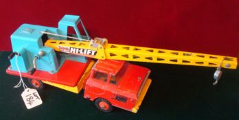 Triang Hi-Lift Crane: Made from metal painted Red, Yellow and Blue with real crane operation