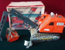 Alps (Japan) Tinplate Crane: With magnetic shovel and remote control battery powered - in orange