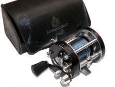 REELS: (2) Pair of unusual alloy/brass twisting foot side cast reels a 3.5? diameter black finish