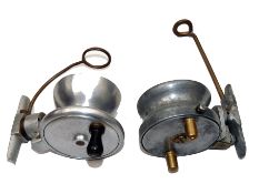 REELS: (2) Pair of unusual alloy Malloch style twisting foot side cast reels a 2.75? diameter