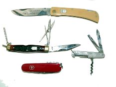 KNIVES: (4) Collection of 4 angler?s knives a Carl Schlieper forged knife by Solingen Germany a 4?