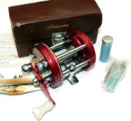 REEL: Abu Sweden Ambassadeur 6000 multiplier reel 4 screw red grooved end plates single white