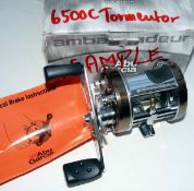 REEL: Abu 6500C Tormentor Ambassadeur reel marked ?Sample? to foot ex-factory display reel bronze