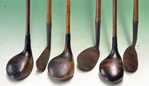 6x Geo Johnson, West Runton golf clubs including 2x stained persimmon drivers and a stripe topped