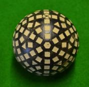 An unusual pattern repainted rubber core golf ball c1905 – comprising hexagonal, triangular and