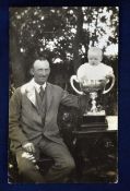 Fred Robson golfing postcard - With his baby son holding large silver cup. Handwritten on