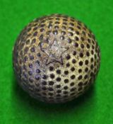 Rare "Star" marked miniature bramble pattern golf ball with the Star stamp to both poles – retaining