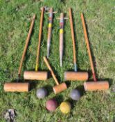 Croquet - collection of 4x matching full size croquet mallets, 4x chequered wooden coloured balls