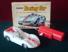 Marx Toys of Hong Kong - Battery operated remote control Famous Racing Car - white, red trim, plated