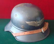 WW2 German Luftschutz Helmet: This is a Blue example still retaining its original transfer to