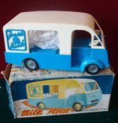 Mettoy (UK) No.872 friction drive Milk Float: Cream upper, blue lower, Metal hubs, friction drive to