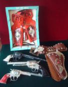 Selection of Cowboy Guns and Holsters: To include Boxed set of Holsters, Set of Wyatt Earp