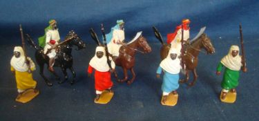 Britains Metal Arab Figures: To include 3 Horsemen and 4 Standing Figures all having moving Arms (7)