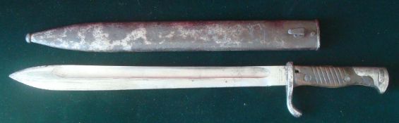 WW1 German Butcher Blade Bayonet: This bayonet has a 14 1/2” long blade, marked Fichtel & Sachs
