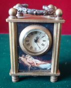 Miniature Brass Carriage Clock With Erotic Panels: Having bevelled glass jewelled clock with