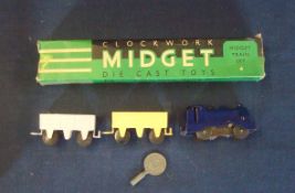 Chad Valley Clockwork Midget Train Set: To include Engine and two Rolling Stock made from Metal in