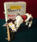 Pelham Puppets Present Muffin the Mule: Wooden marionette style Puppet figure is white, with black/