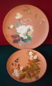 Pair of Watcombe Pottery Terra Cotta Hand Painted Plates: Having floral and leaf design Larger plate