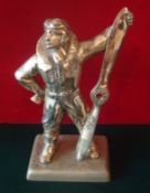 Unusual Pilot Table Lighter: In full pilots Uniform with flying helmet standing holding a