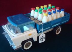 Triang Tin Plate Bottle Lorry: Good example having 20 original Bottles overall condition clean (