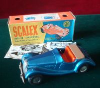 Scalex MG TF Sports Cars: Blue with Orange seats, lacks rear spare wheel but includes steering wheel