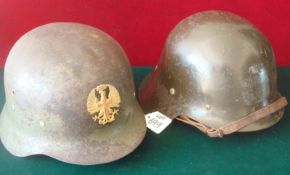 Spanish Civil War Helmet Complete With Badge: Used but somewhat worn example still retaining Liner