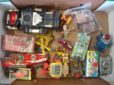 Mixed Selection of Plastic and Tin Plate Toys: To include Magic Mike II Robot, Clockwork Tanks, Miss