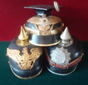 Three Reproduction Pickelhaube Helmets: All having helmets plates and Liners (possibly one having