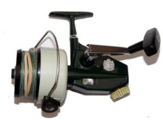 REEL: Abu Cardinal 77 spinning reel in green/cream finish, foot stamped Sweden 750907, optional