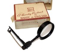 ACCESSORY: Fine Hardy The Wardle magnifier glass with hinged jacket pin, maker`s details stamped