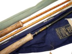 RODS: (2) Hardy Graphite 9` 2 piece trout fly rod, matt varnish, guides whipped black, tipped red,