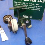 REEL: Abu Cardinal 33 Swedish built fixed spool reel in as new condition, foot stamp 760301, green/