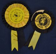 2x Wellington (NZ) Rugby Supporters Rosettes - black and gold ribbons and titled “C’Mon Wellington”