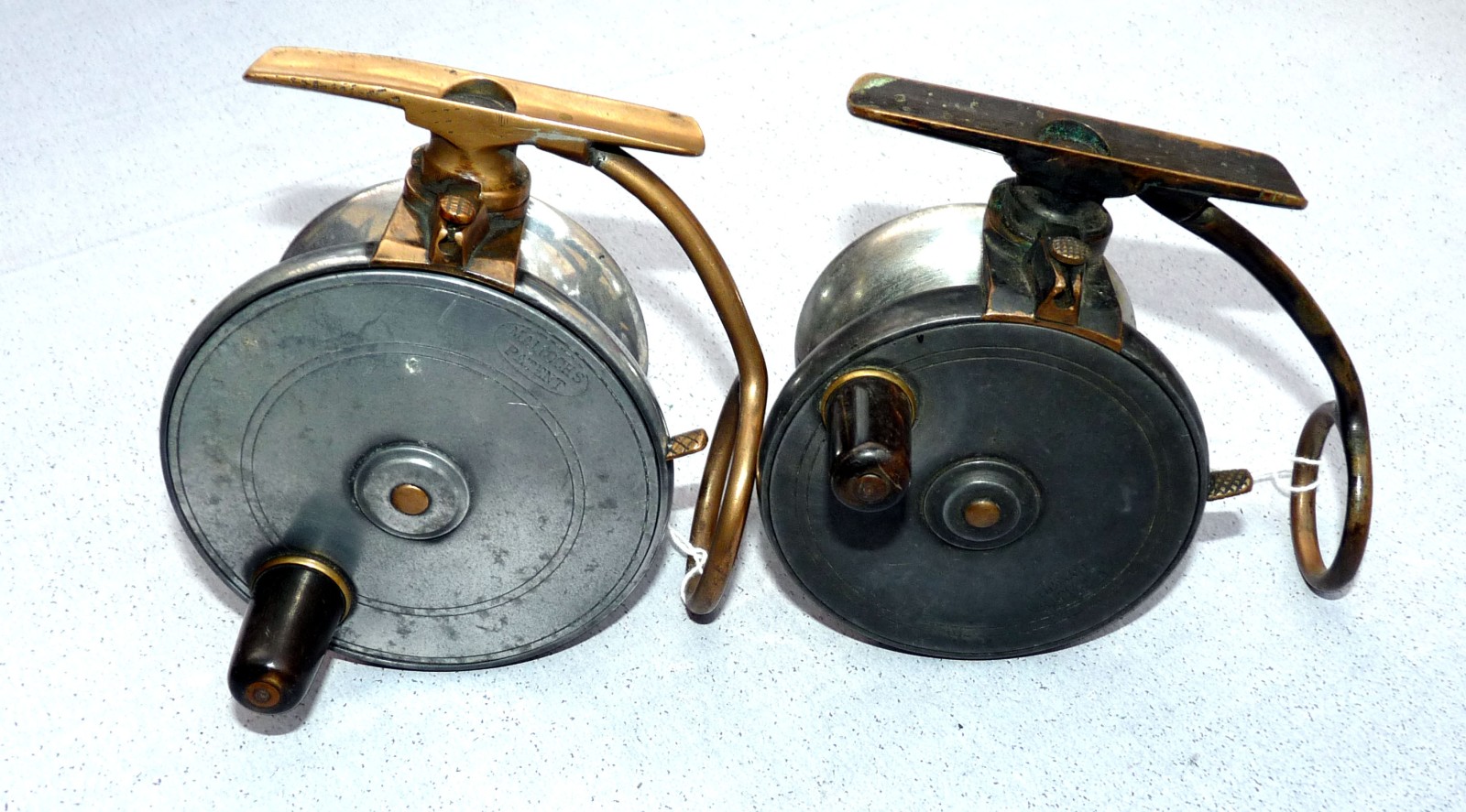 REELS (2): Pair of Malloch Patent alloy/brass side casting reels, a 3.25” diameter model with