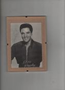 Autograph ? modern entertainment ? Elvis Presley postcard sized photograph showing him looking