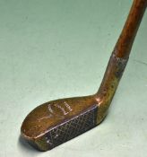 Brass mallet head `Zozo` style putter with a metal face insert showing the Anderson arrow to the
