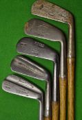 5x Assorted irons including a Maxwell flanged soled mid iron, a Tom Stewart mashie iron showing