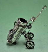 1950s white metal golf trolley and golf clubs â€“ containing 3 silver golf clubs stamped .925,