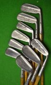 8x Matching Maxwell drilled hosel flanged bottom irons including driving iron a three iron, a