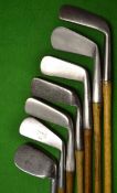 7x Assorted smf clubs consisting of a Tom Stewart left hand mashie, 2 x bend neck putters and a