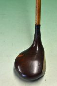 Fine McLelland large shallow face dark stained persimmon socket head brassie with back fibre