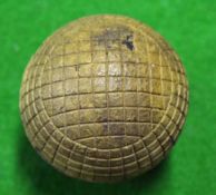 Scarce and unusual mesh moulded pattern guttie/composite golf ball â€“ unused and appears never to