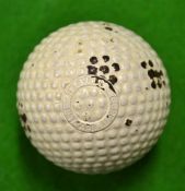 Fine and scarce early Haskell bramble pattern rubber core golf ball â€“ retaining 95% original white