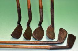 6 x Assorted irons including 3 x Smith patent anti-shanks by W Gibson 2 x mashies and a niblick, a